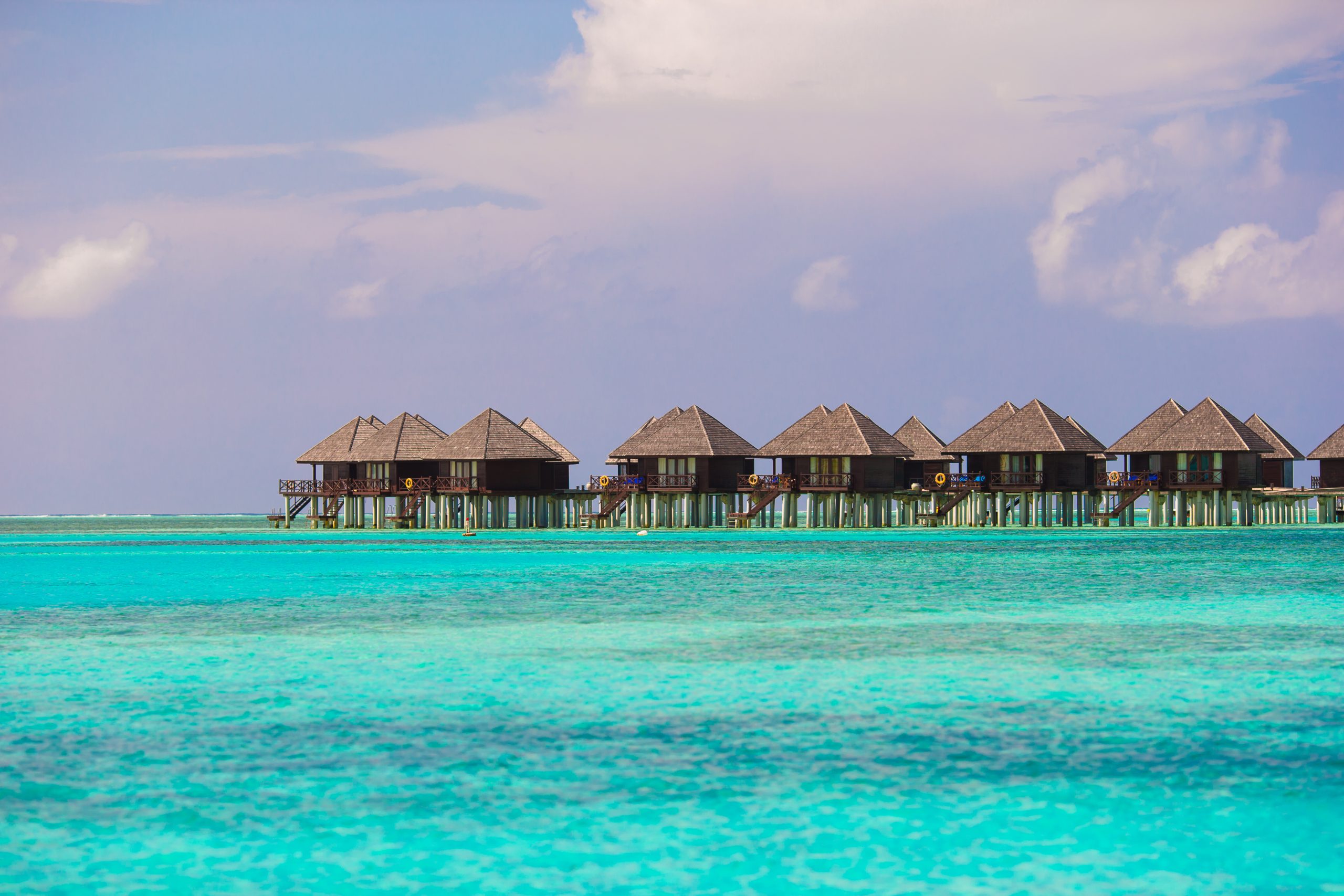 Water villas Bungalows on ideal perfect tropical island, Maldives